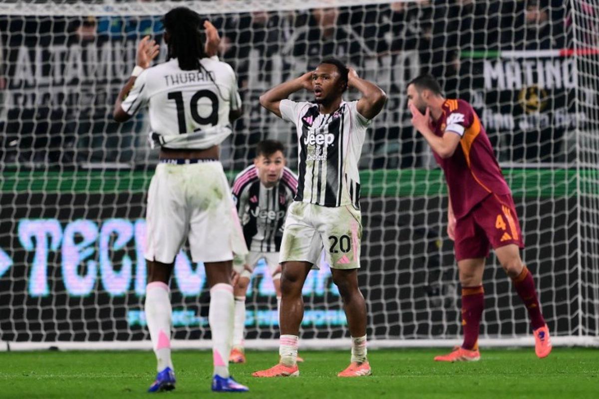 Juventus' Belgian forward #20 Lois Openda (C) reacts during the Italian Serie A football match between Juventus and AS Roma at the Allianz stadium in Turin, northern Italy, on December 20, 2025. MARCO BERTORELLO / AFP