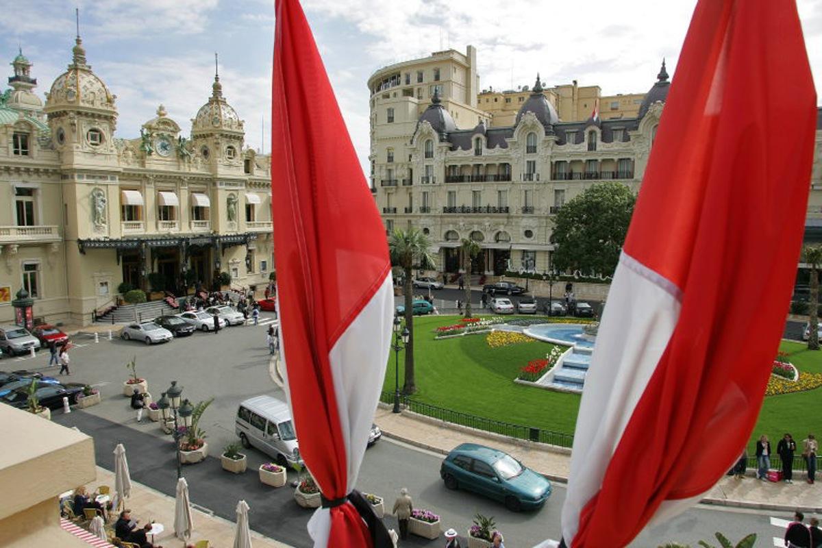 National red-and-white banners fly at half-mast above the Casino square, 13 April 2005 in Monaco, two days before the funeral of Prince Rainier III of Monaco. The prince who ruled the Mediterranean statelet since 1949, died at the age of 81 after a month-long hospitalization with severe breathing and heart problems, 06 April 2005 in the principality. DOMINIQUE FAGET / AFP