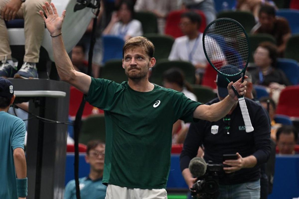 Belgium's David Goffin reacts after victory against USA's Ben Shelton during their men's singles match at the Shanghai Masters tennis tournament in Shanghai on October 3, 2025. Jade Gao / AFP