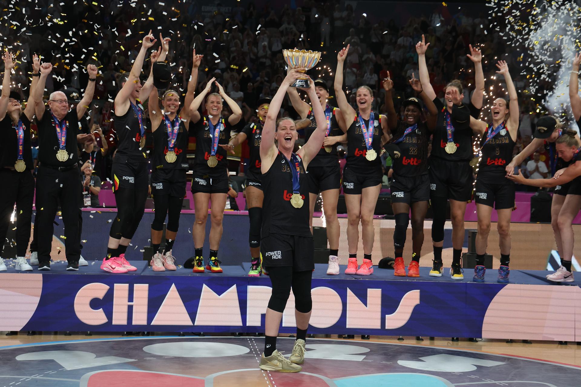 Belgium's captain Emma Meesseman celebrates with the cup on the podium after winning a basketball match between Spain and Belgian national team 'the Belgian Cats' on Sunday 29 June 2025 in Piraeus, Greece, the final of the FIBA Women's EuroBasket 2025. BELGA PHOTO VIRGINIE LEFOUR