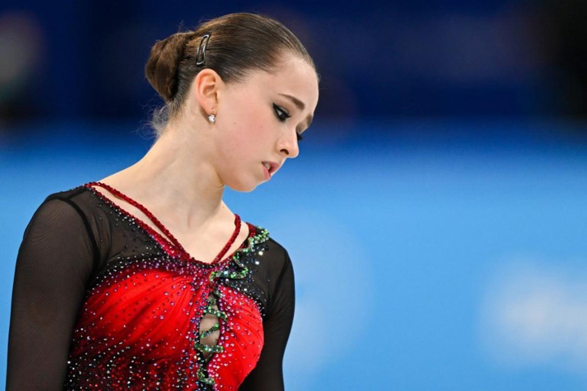 Russia's Kamila Valieva reacts after competing in the women's single skating free skating of the figure skating event during the Beijing 2022 Winter Olympic Games at the Capital Indoor Stadium in Beijing on February 17, 2022. Manan VATSYAYANA / AFP