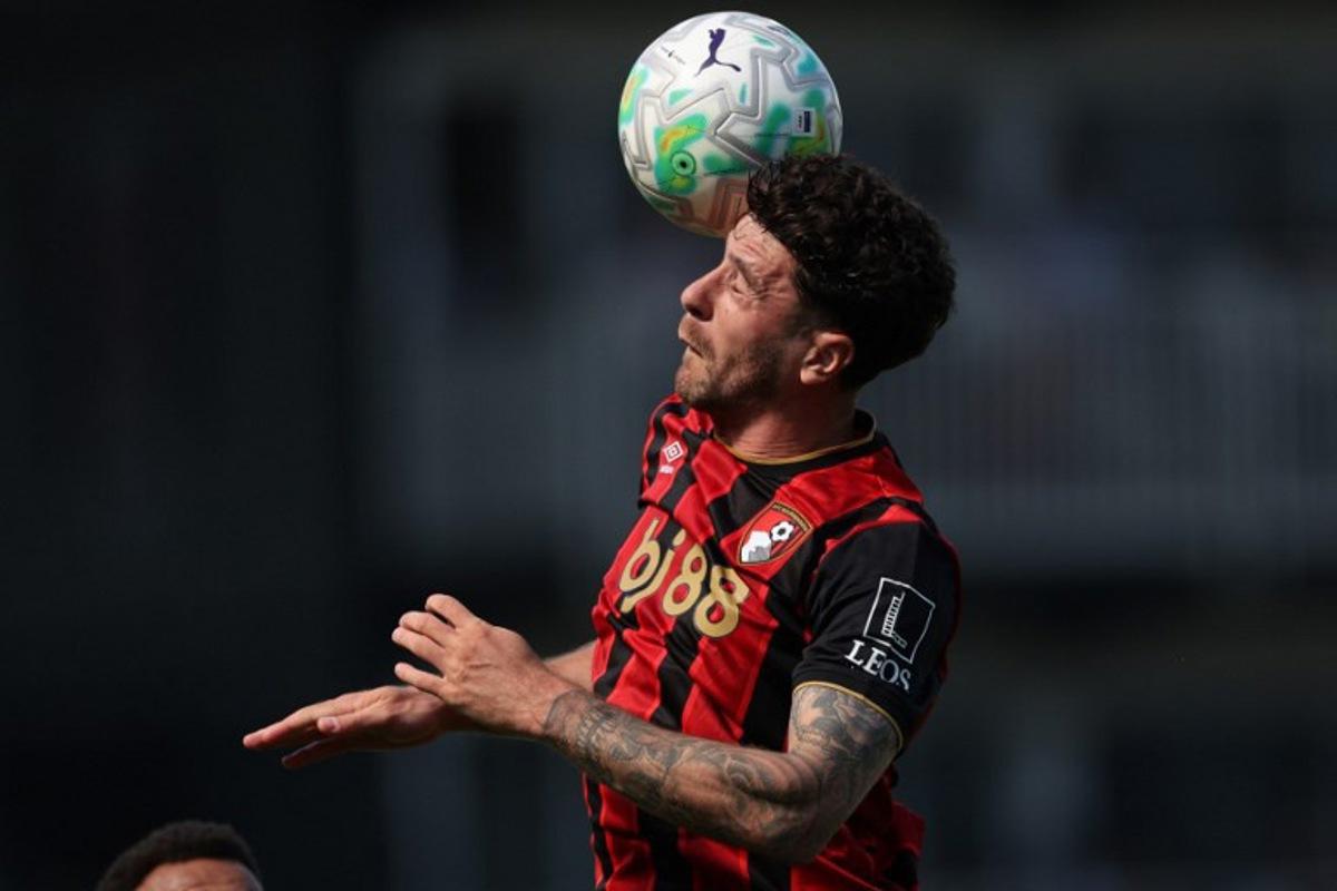 Bournemouth's Argentinian defender #05 Marcos Senesi wins a header during the English Premier League football match between Fulham and Bournemouth at Craven Cottage in London on May 9, 2026. Adrian Dennis / AFP