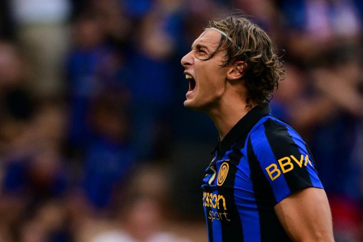 Inter Milan's Italian forward #94 Francesco Pio Esposito celebrates after scoring his team third goal during the Italian Serie A football match between Inter Milan and AC Monza at the San Siro stadium in Milan, northern Italy on August 22, 2026. Marco Bertorello / AFP