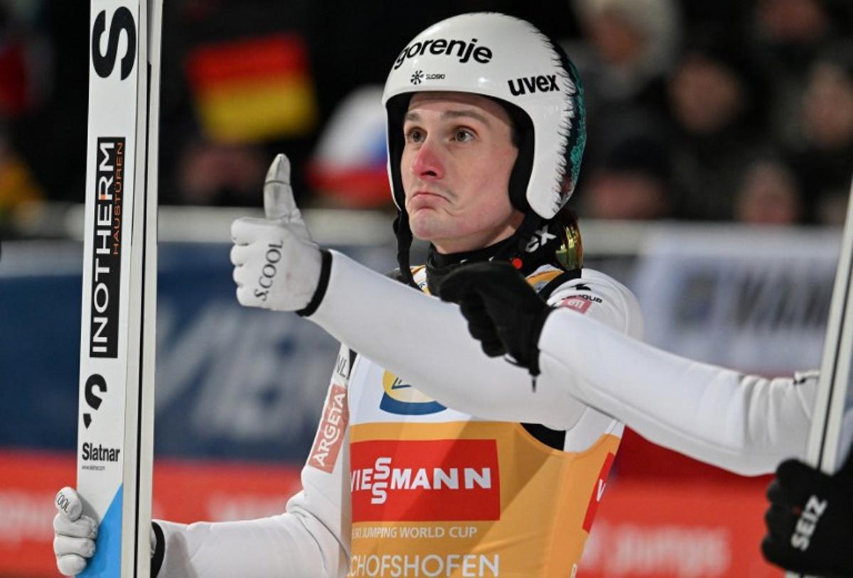 Slovenia's Domen Prevc reacts after competing in the Men's Individual Large Hill HS142 event of the FIS Ski Jumping World Cup, the fourth and last leg of the Four Hills Tournament, in Bischofshofen, Austria on January 6, 2026. KERSTIN JOENSSON / AFP