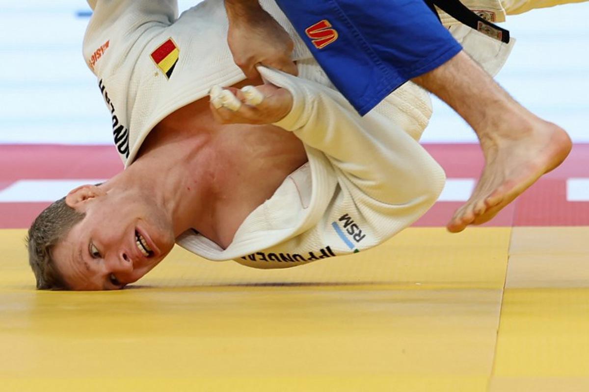 Belgium's Matthias Casse (white) and Azerbaijan's Zelim Tckaev compete in the men's under 81 kg category bronze medal bout at the Judo European Senior Championships 2026 in Tbilisi on April 18, 2026. Giorgi ARJEVANIDZE / AFP