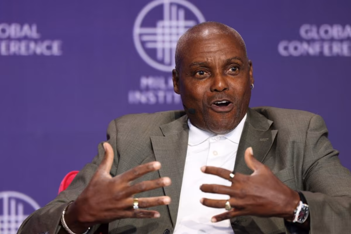 US Olympian Carl Lewis speaks during the Milken Institute Global Conference in Beverly Hills, California on May 6, 2025. Patrick T. Fallon / AFP