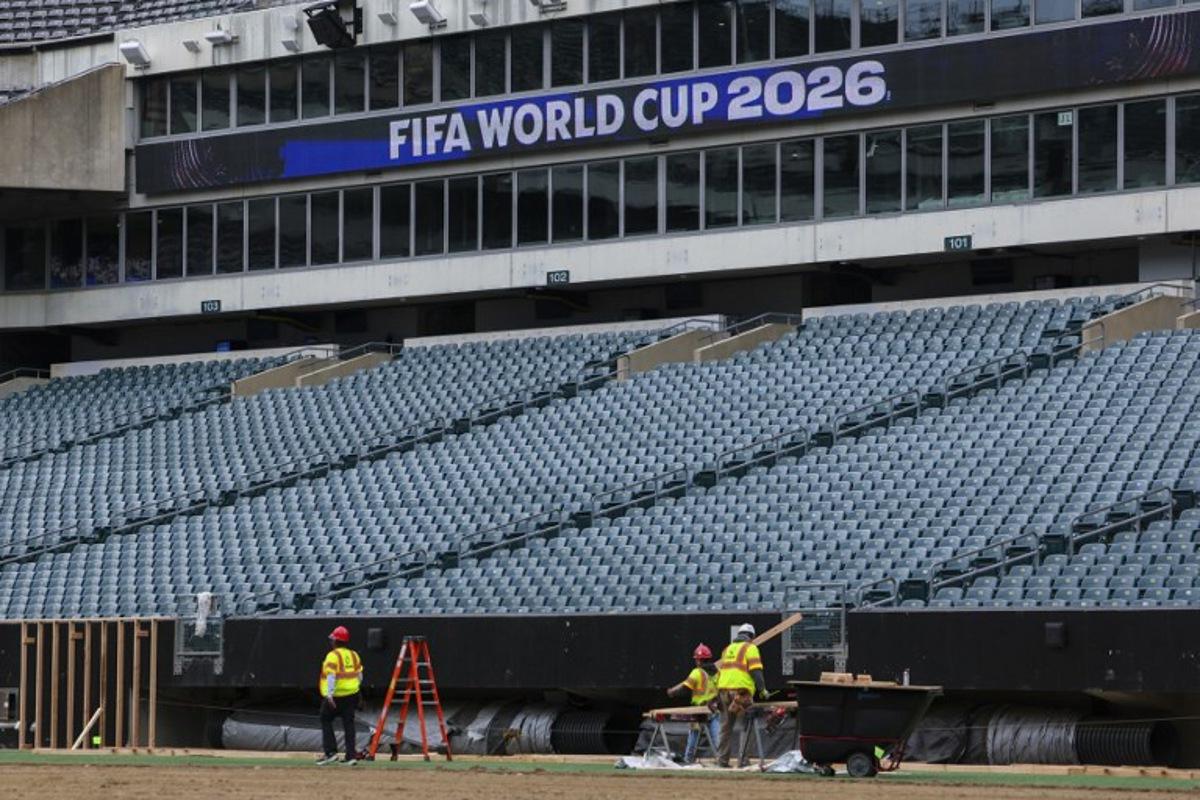 Workers prepare the field at Lincoln Financial Field, one of the stadiums hosting the 2026 FIFA World Cup at Lincoln Financial Field in Philadelphia, on April 28, 2026. ANGELA WEISS / AFP