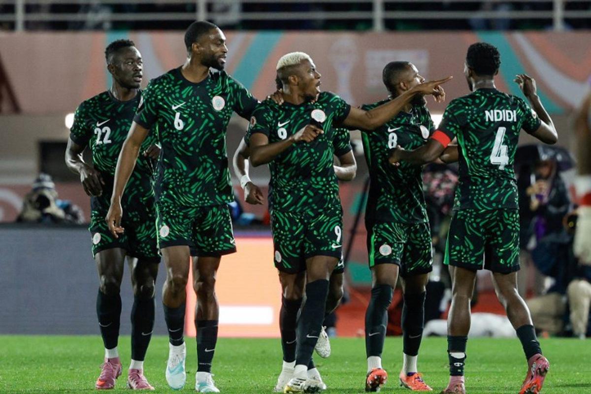 Nigeria's forward #09 Victor Osimhen (C) celebrates his goal during the Africa Cup of Nations (CAN) Group C football match between Nigeria and Tunisia at Fez Stadium in Fez on December 27, 2025. Abdel Majid BZIOUAT / AFP