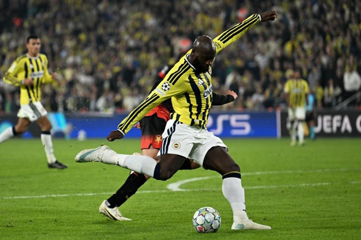 Fenerbahce's Belgian forward #09 Romelu Lukaku shoots the ball during the UEFA Champions League first round day 3 football match between Fenerbahce and Slavia Prague at the Fenerbahce Sukru Saracoglu Spor Kompleksi stadium in Istanbul on October 20, 2026. OZAN KOSE / AFP