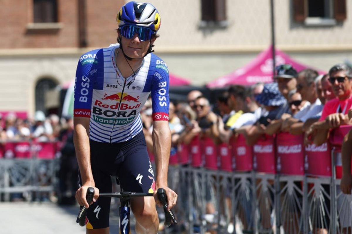 Red Bull - BORA - hansgrohe Italian rider Giulio Pellizzari arrives at the presentation prior the 17th stage of the Giro d'Italia 2026 - Tour of Italy cycling race between Cassano d'Adda and Andalo, Italy, on May 27, 2026. Luca Bettini / AFP