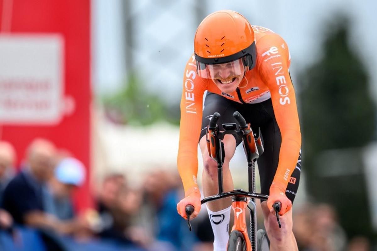 INEOS Grenadiers' French rider Dorian Godon competes in the prologue of the Tour of Romandie UCI cycling World tour, a 3.2 km time trial from Villars-sur-Glane to Villars-sur-Glane on April 28, 2026. Fabrice COFFRINI / AFP