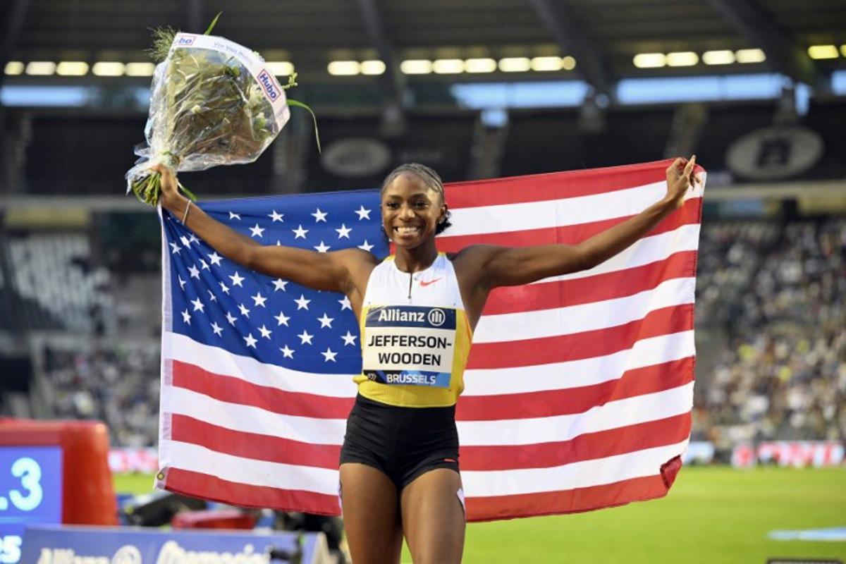 US' Melissa Jefferson-Wooden celebrates after winning the Women's 100m event of the Diamond League athletics meeting at the King Baudouin Stadium in Brussels on August 22, 2025. JOHN THYS / AFP