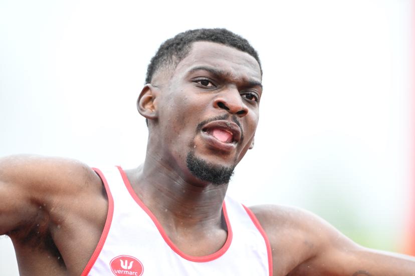 Belgian Elie Bacari celebrates as he crosses the finish line to win the Belgian athletics championships, Sunday 26 July 2026 in Kessel-Lo, Leuven. BELGA PHOTO JILL DELSAUX