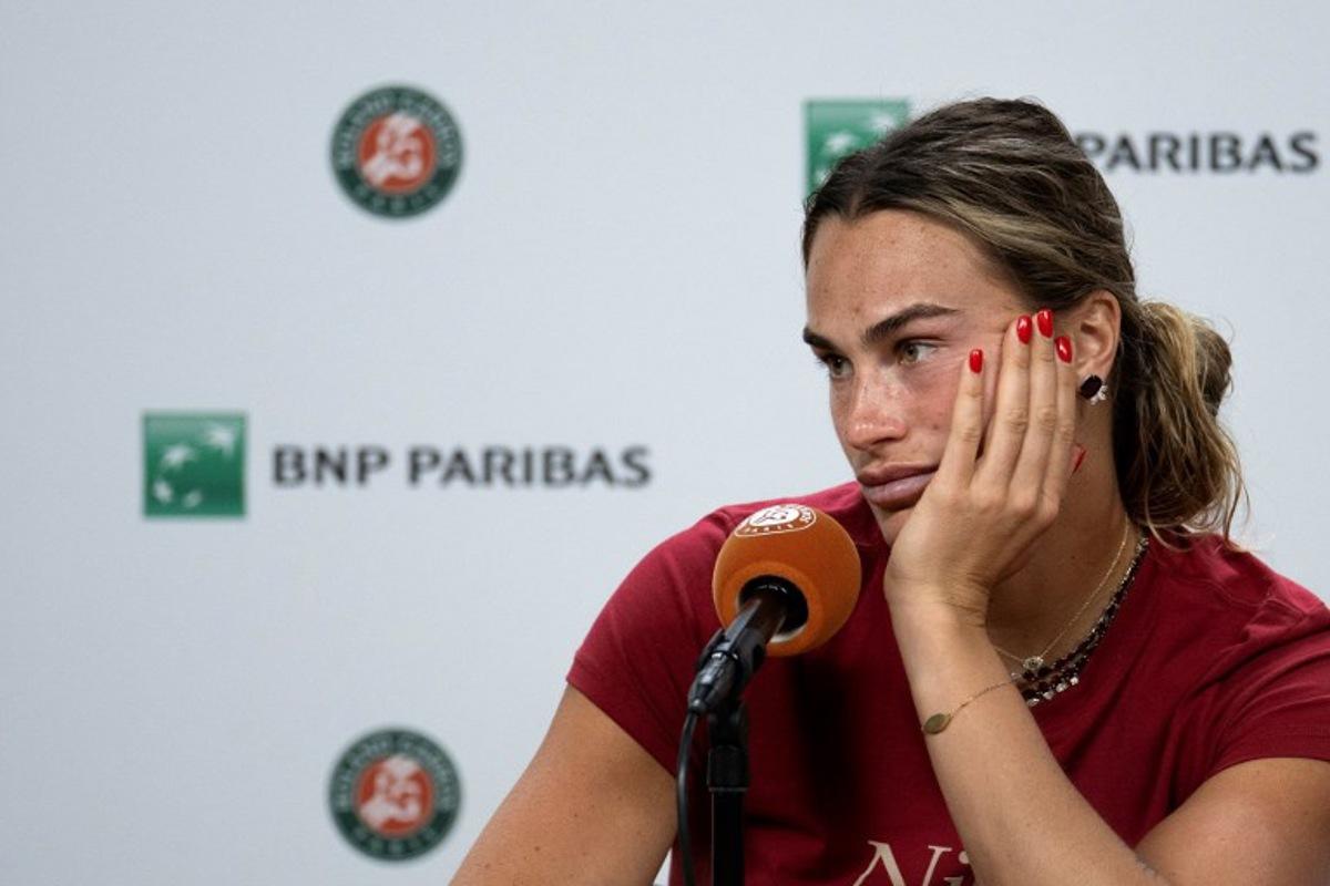 Aryna Sabalenka reacts during a press conference after being defeated by Diana Shnaider during their women's quarter final singles match on day 11 of the French Open tennis tournament on Court Philippe-Chatrier at the Roland-Garros Complex in Paris on June 3, 2026. Sébastien DUPUY / AFP