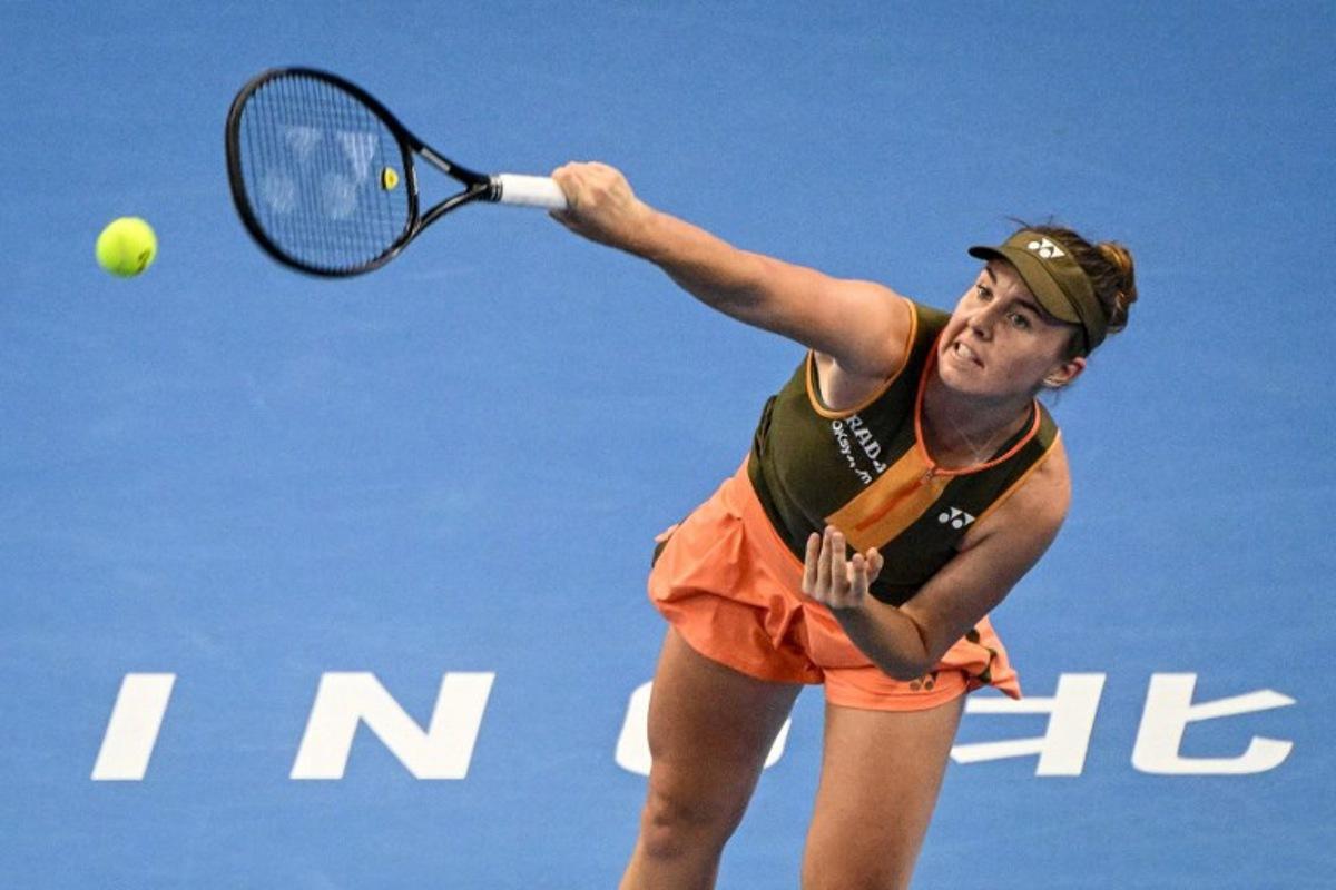 Czech Republic's Linda Noskova serves to the USA's Jessica Pegula during their women's singles semi-final match at the China Open tennis tournament in Beijing on October 4, 2025. Greg Baker / AFP