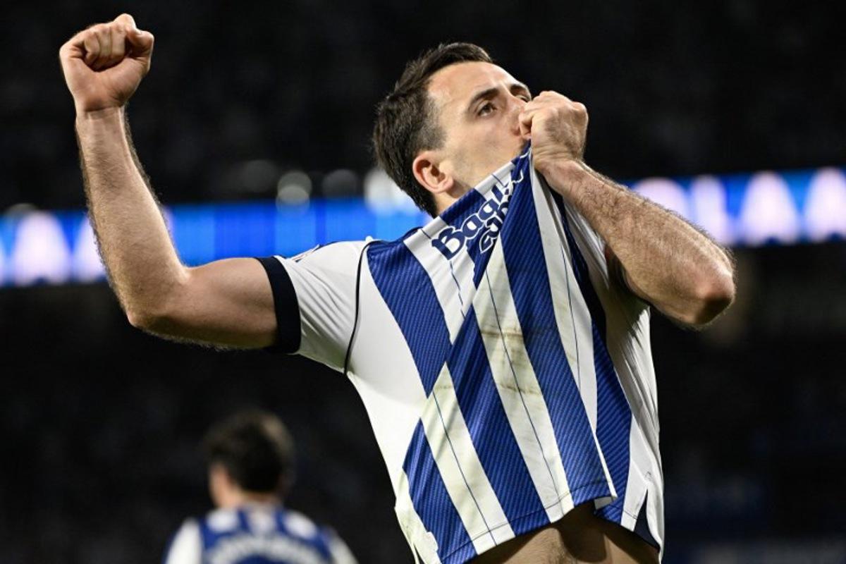 Real Sociedad's Spanish forward #10 Mikel Oyarzabal celebrates scoring his team's first goal from the penalty spot during the Copa del Rey (King's Cup) semi final second leg football match between Real Sociedad and Athletic Club Bilbao at thep Anoeta Stadium in San Sebastian on March 4, 2026. ANDER GILLENEA / AFP