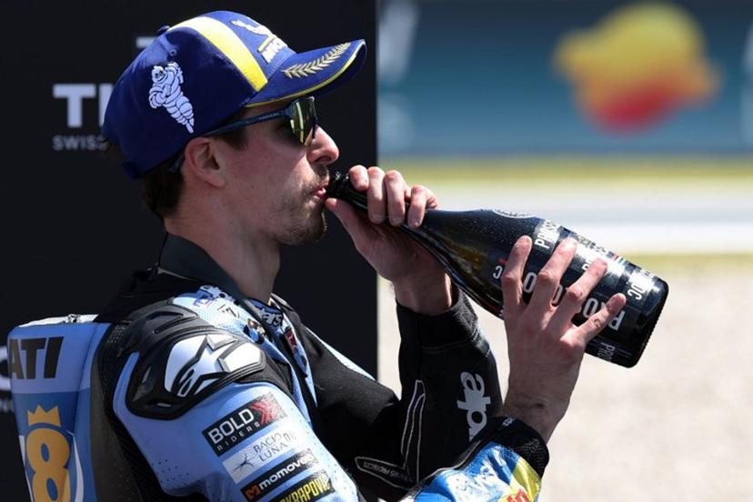 Team Gresini Racing MotoGP's Alex Marquez celebrates winning the Sprint Race at the Catalunya Moto GP Grand Prix at the Catalunya racetrack in Montmelo, near Barcelona, on May 16, 2026. Lluis GENE / AFP