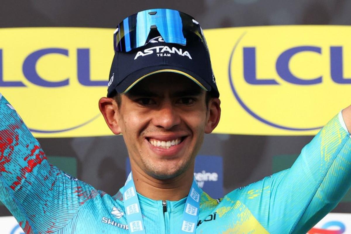 XDS Astana Team's Colombian rider Harold Tejada celebrates on the podium after winning the 6th stage of the Paris-Nice cycling race, 179.3 km between Barbentane and Apt, on March 13, 2026. Anne-Christine POUJOULAT / AFP