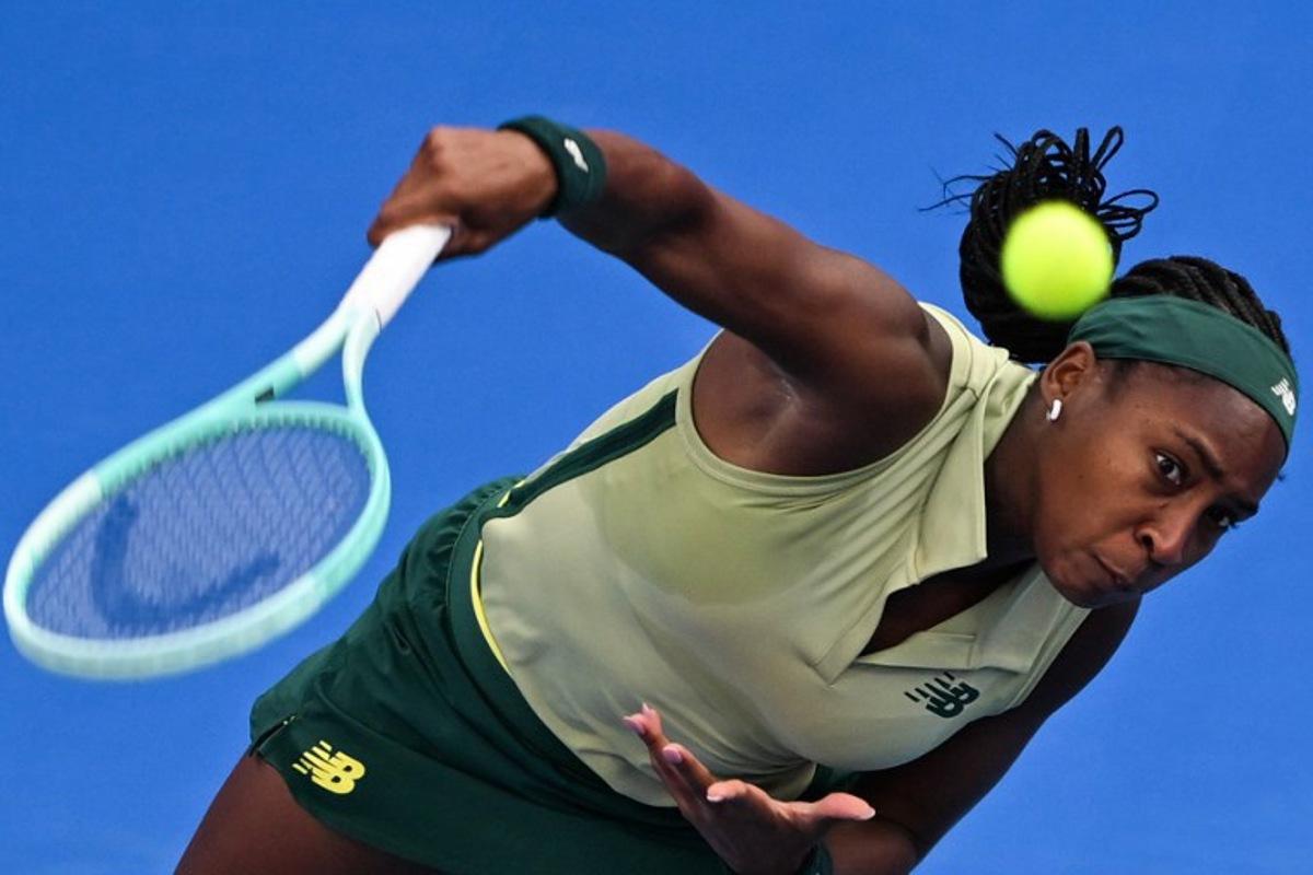 Coco Gauff of the USA serves the ball to Marta Kostyuk of the Ukraine during their 2025 WTA Qatar Open match at the Khalifa International Tennis Complex in Doha on February 11, 2025. Mahmud HAMS / AFP
