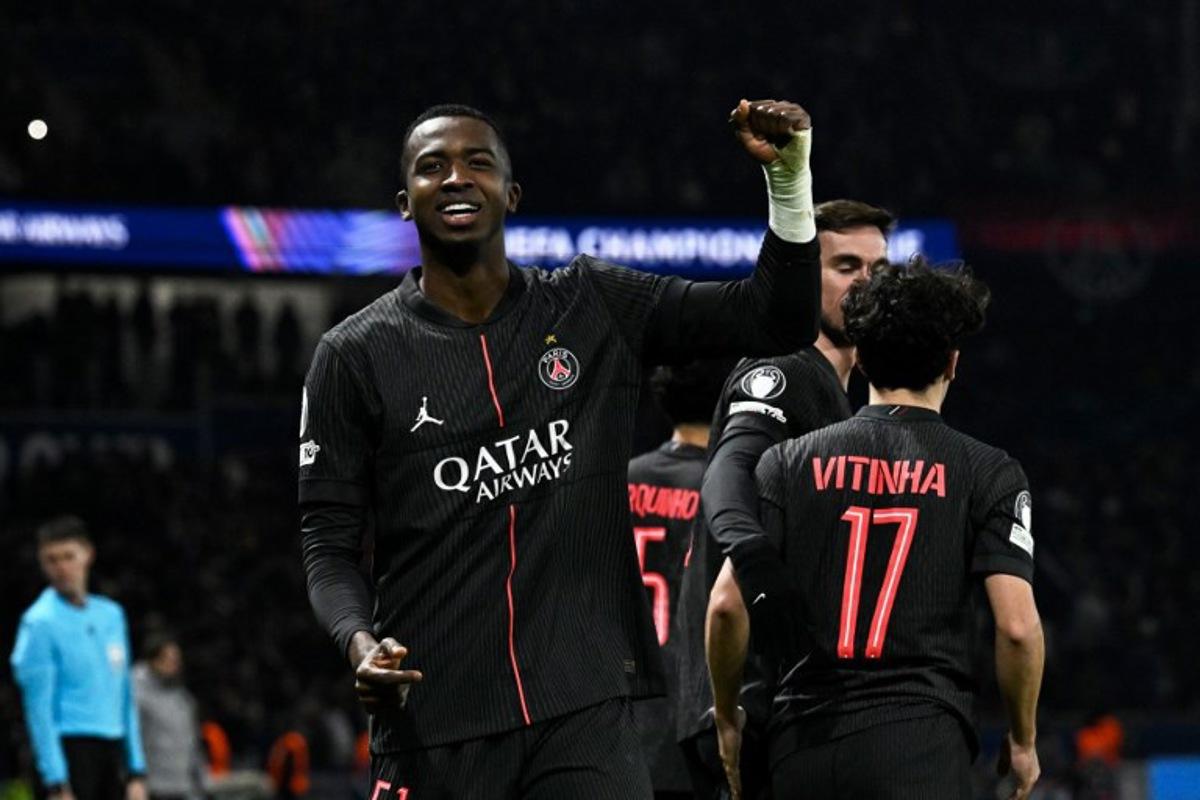Paris Saint-Germain's Ecuadoran defender #51 Willian Pacho celebrates after scoring his team's fourth goal during the UEFA Champions League, league phase - matchday 5, football match between Paris Saint-Germain (PSG) and Tottenham Hotspur FC at the Parc des Princes stadium in Paris on November 26, 2025. JULIEN DE ROSA / AFP