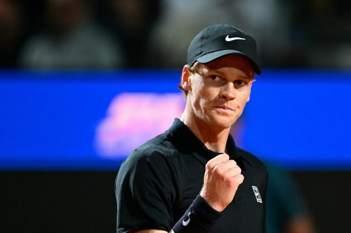 Italy's Jannik Sinner reacts during his men's singles semi-final match against USA's Tommy Paul for the ATP Rome Open tennis tournament at Foro Italico in Rome on May 16, 2025. Tiziana FABI / AFP