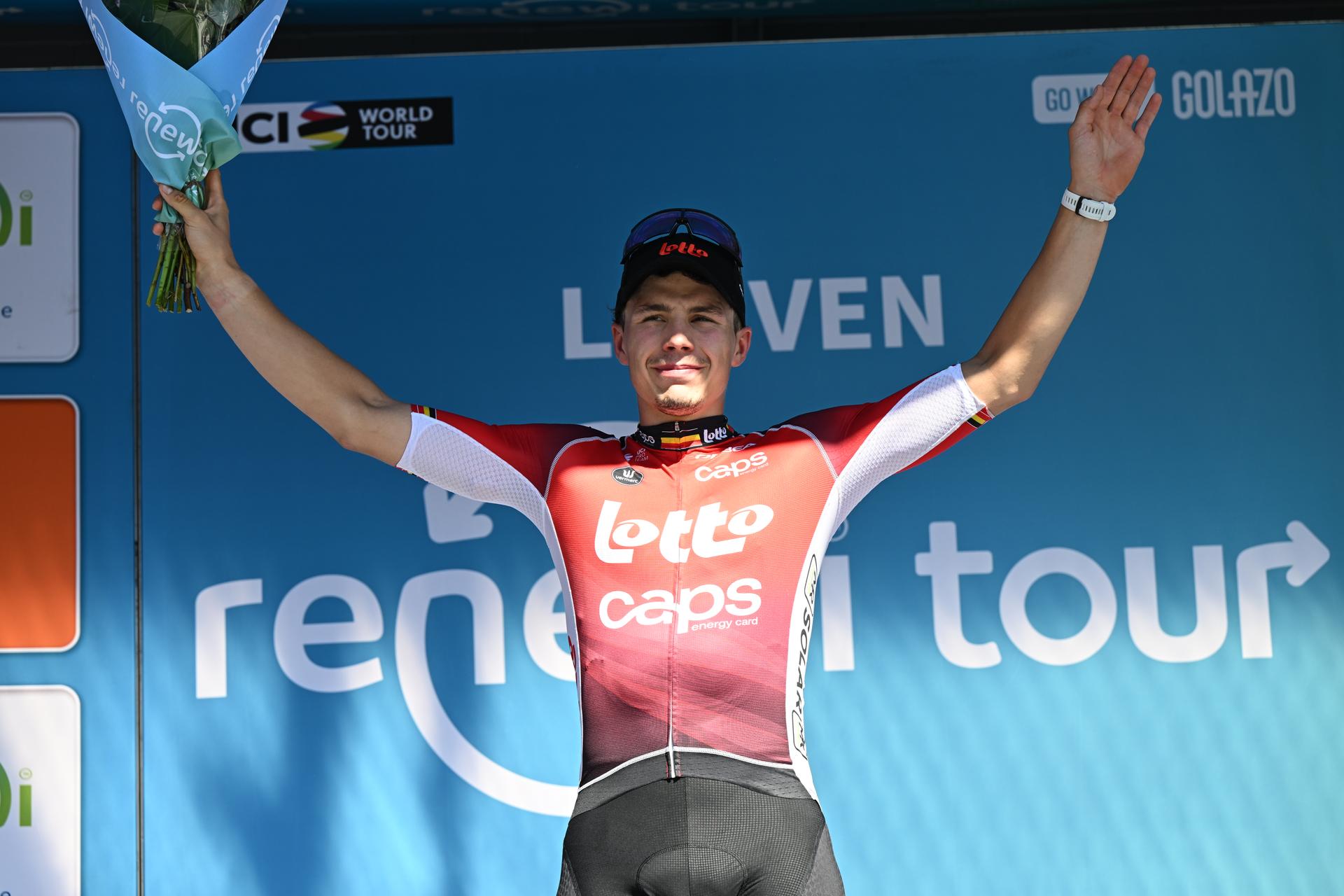 Belgian Arnaud De Lie of Lotto Cycling Team celebrates on the podium after winning the fifth and last stage of the 'Renewi Tour' multi-stage cycling race, 185km from and to Leuven on Sunday 24 August 2025. The five-day race takes place in Belgium and the Netherlands. BELGA PHOTO DAVID PINTENS