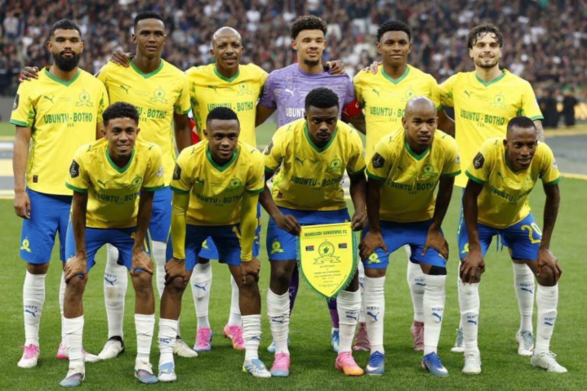 Mamelodi Sundowns' players pose for a group photo before the start of the CAF Champions League final football match between Mamelodi Sundowns and AS FAR at the Prince Moulay Abdellah Stadium in Rabat on May 24, 2026. Abdel Majid BZIOUAT / AFP