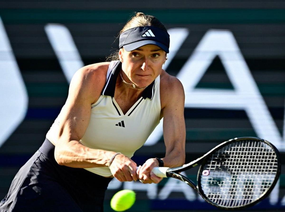 Ukraine's Elina Svitolina returns the ball to the Philippines' Alexandra Eala during the women's singles quarter-final match at the WTA500 Berlin Tennis Open tournament in Berlin on June 19, 2026. Tobias SCHWARZ / AFP