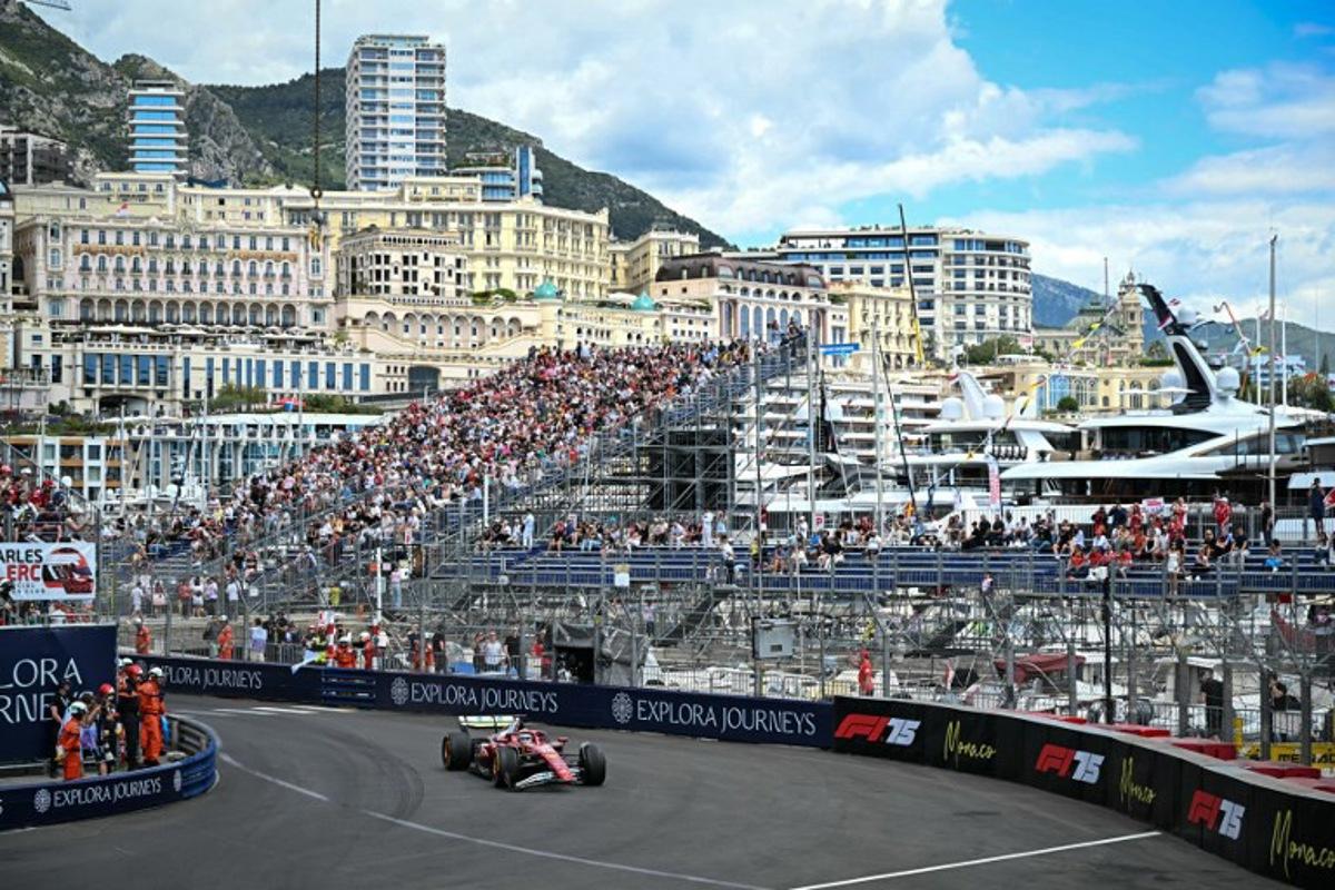 Ferrari's Monegasque driver Charles Leclerc drives with a damaged front wing during the first practice session for the Formula One Monaco Grand Prix at the Circuit de Monaco, on May 23, 2025, two days ahead of the race. Gabriel BOUYS / AFP