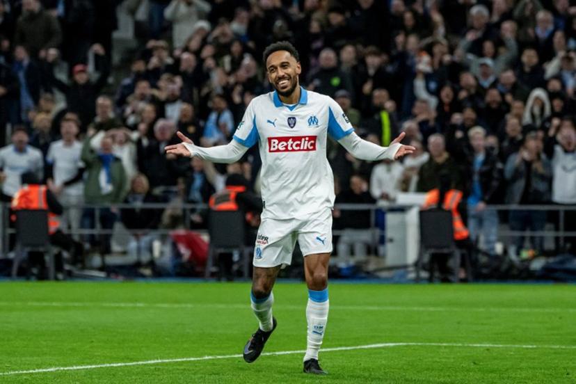 Marseille's Gabonese forward #17 Pierre-Emerick Aubameyang celebrates scoring his team's third goal during the French Cup round of 16 football match between Olympique de Marseille (OM) and Stade Rennais at the Stade Velodrome in Marseille, southern France, on February 3, 2026. MIGUEL MEDINA / AFP