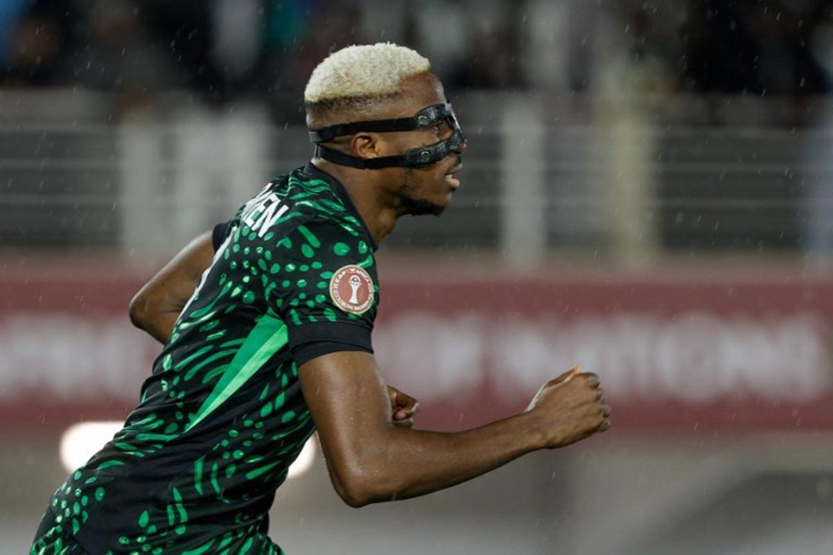 Nigeria's forward #09 Victor Osimhen runs during the Africa Cup of Nations (CAN) Group C football match between Nigeria and Tanzania at Fez Stadium in Fes on December 23, 2025. Abdel Majid BZIOUAT / AFP
