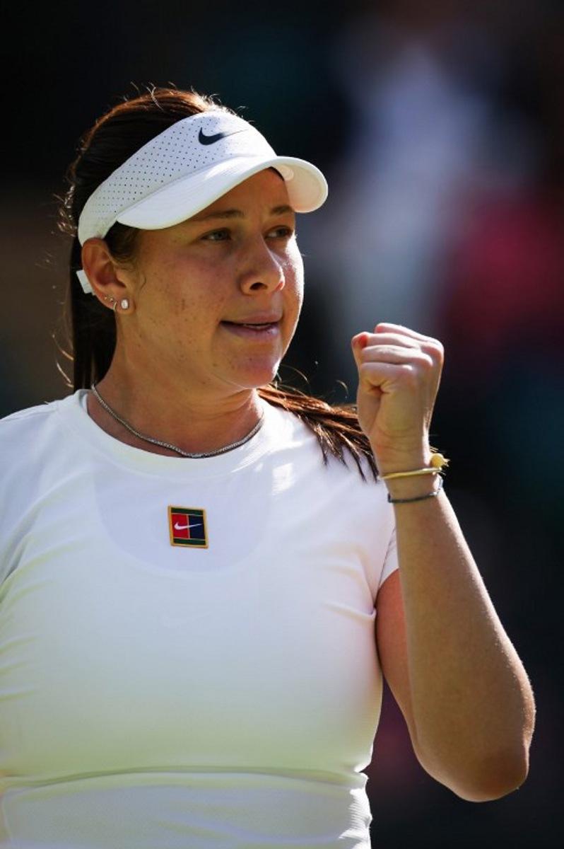 US player Amanda Anisimova celebrates winning the first set against Russia's Anastasia Pavlyuchenkova during their women's singles quarter-final tennis match on the ninth day of the 2025 Wimbledon Championships at The All England Lawn Tennis and Croquet Club in Wimbledon, southwest London, on July 8, 2025. Adrian Dennis / AFP