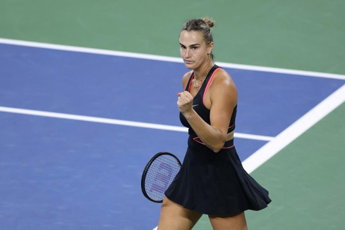 Belarus's Aryna Sabalenka celebrates a point during her women's singles third round tennis match against Canada's Leylah Fernandez on day six of the US Open tennis tournament at the USTA Billie Jean King National Tennis Center in New York City, on August 29, 2025. CHARLY TRIBALLEAU / AFP