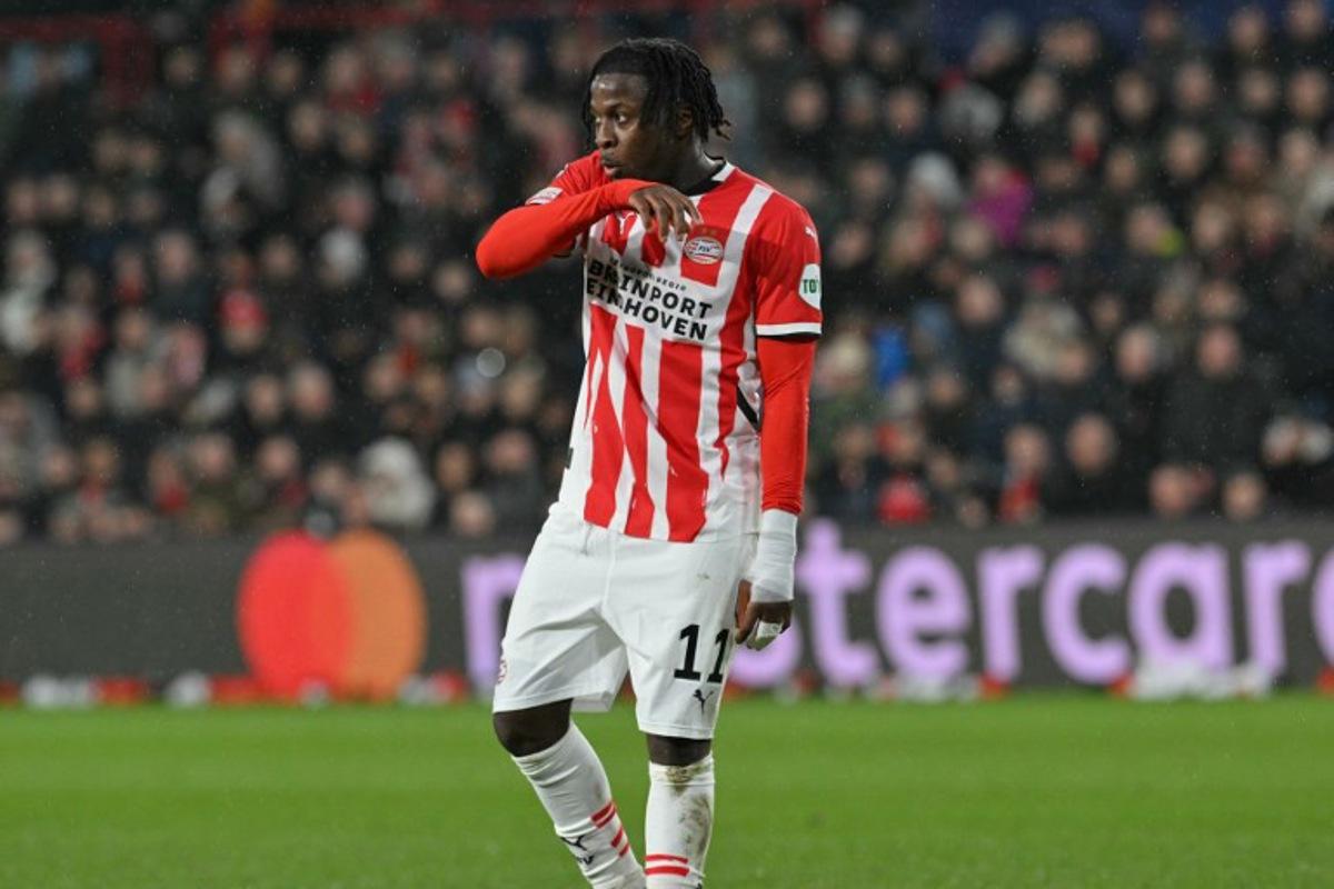 PSV Eindhoven's Belgian forward #11 Johan Bakayoko reacts during the UEFA Champions League, league phase day 8, football match between PSV Eindhoven (NED) and Liverpool FC (ENG) at the the Philips Stadion, in Eindhoven, on January 29, 2025. NICOLAS TUCAT / AFP