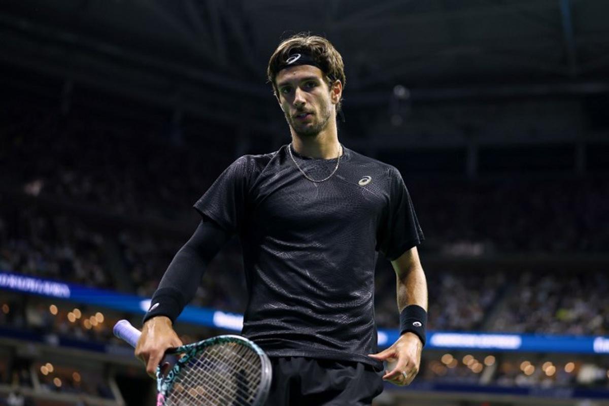 Italy's Lorenzo Musetti looks on during his men's singles quarterfinal tennis match against Italy's Jannik Sinner on day eleven of the US Open tennis tournament at the USTA Billie Jean King National Tennis Center in New York City, on September 3, 2025. CHARLY TRIBALLEAU / AFP