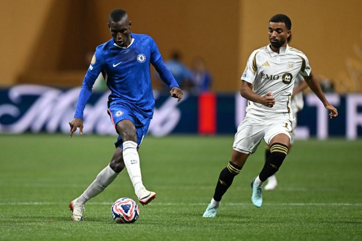 LAFC's German midfielder #11 Timothy Tillman (R) fights for the ball with Chelsea's Senegalese striker #15 Nicolas Jackson during the FIFA Club World Cup 2025 Group D football match between England's Chelsea and US Los Angeles FC at the Mercedes-Benz stadium in Atlanta on June 16, 2025. Paul ELLIS / AFP