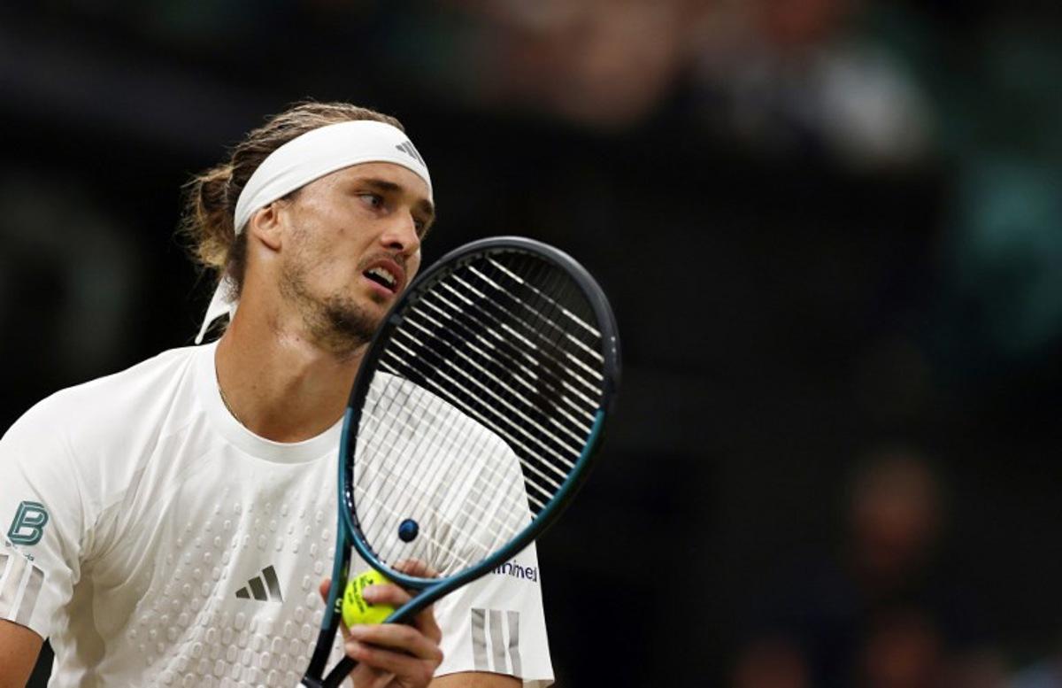 Germany's Alexander Zverev serves to Czech Republic's Jiri Lehecka during their men's singles round of 16 tennis match on the eighth day of the 2026 Wimbledon Championships at The All England Lawn Tennis and Croquet Club in Wimbledon, southwest London, on July 6, 2026. Adrian Dennis / AFP