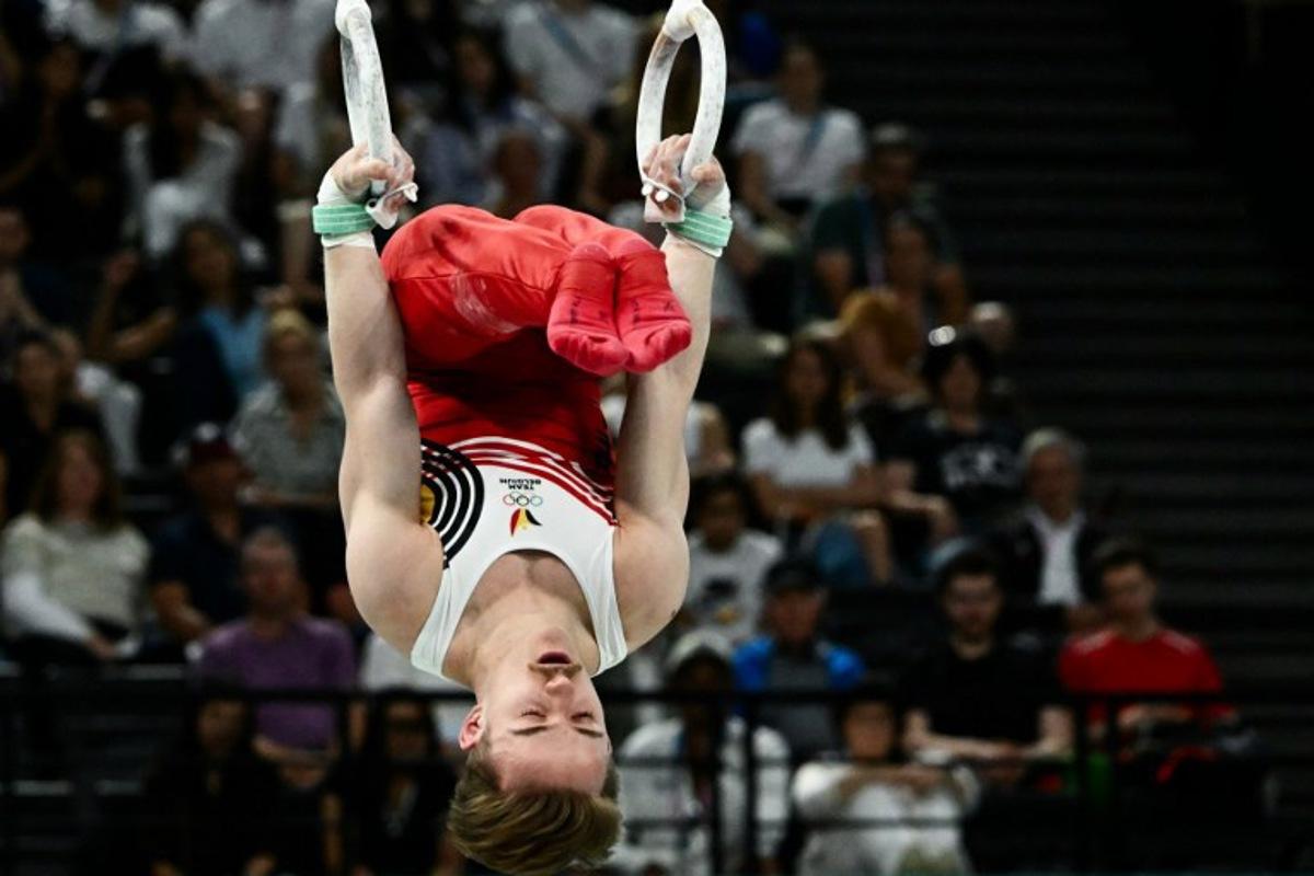 Belgium's Glen Cuyle competes in the artistic gymnastics men's rings final during the Paris 2024 Olympic Games at the Bercy Arena in Paris, on August 4, 2024. Loic VENANCE / AFP