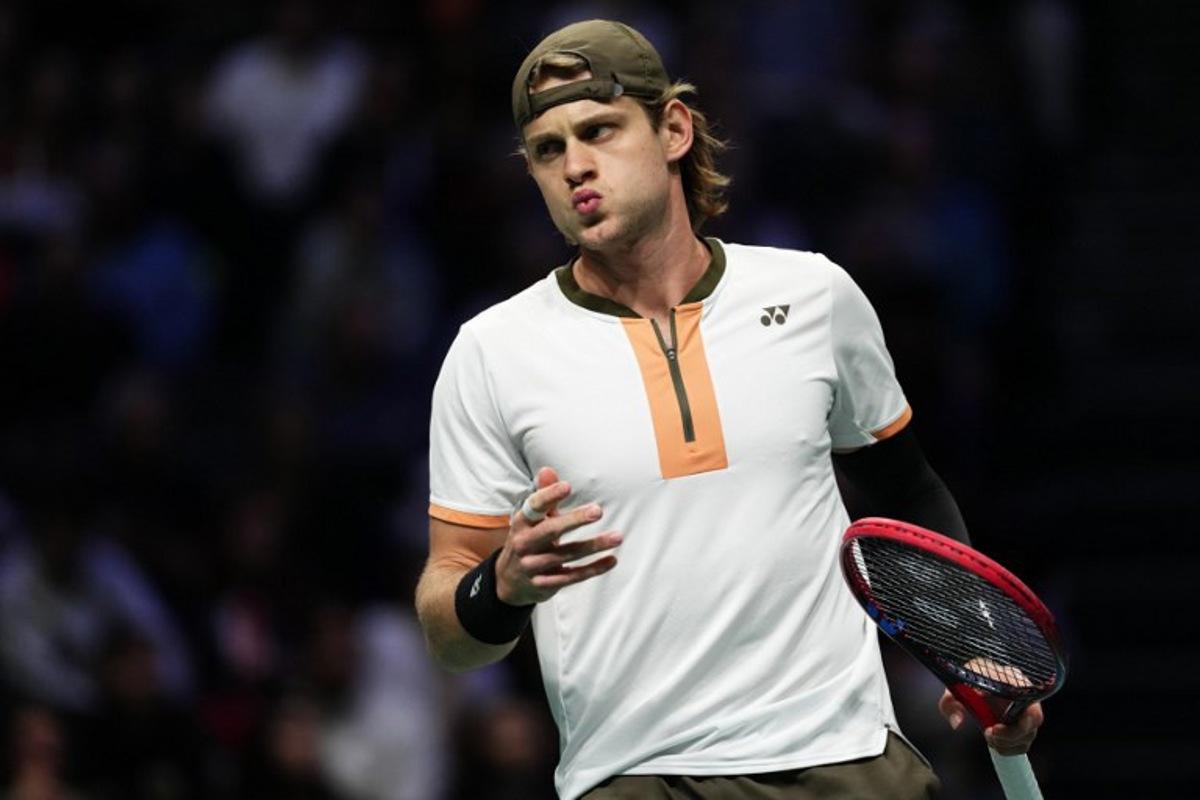Belgium's Zizou Bergs reacts as he plays against Italy's Jannik Sinner during their men's singles match on day three of the Paris ATP Masters 1000 tennis tournament at the Paris La Défense Arena in Nanterre, on the outskirts of Paris, on October 29, 2025. Dimitar DILKOFF / AFP