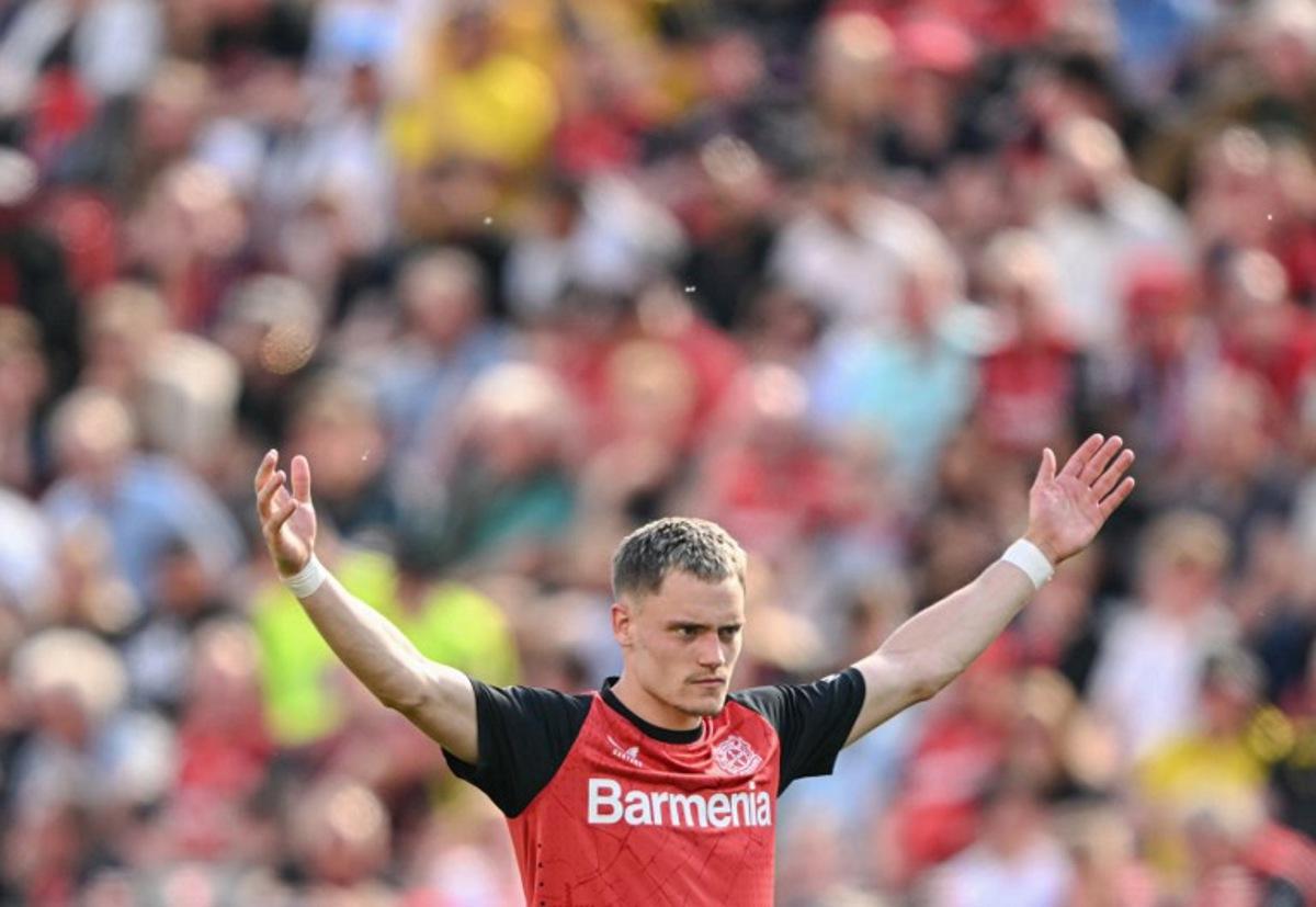 Bayer Leverkusen's German midfielder #10 Florian Wirtz reacts during the German first division Bundesliga football match between Bayer 04 Leverkusen and Borussia Dortmund in Leverkusen, western Germany, on May 11, 2025. INA FASSBENDER / AFP
