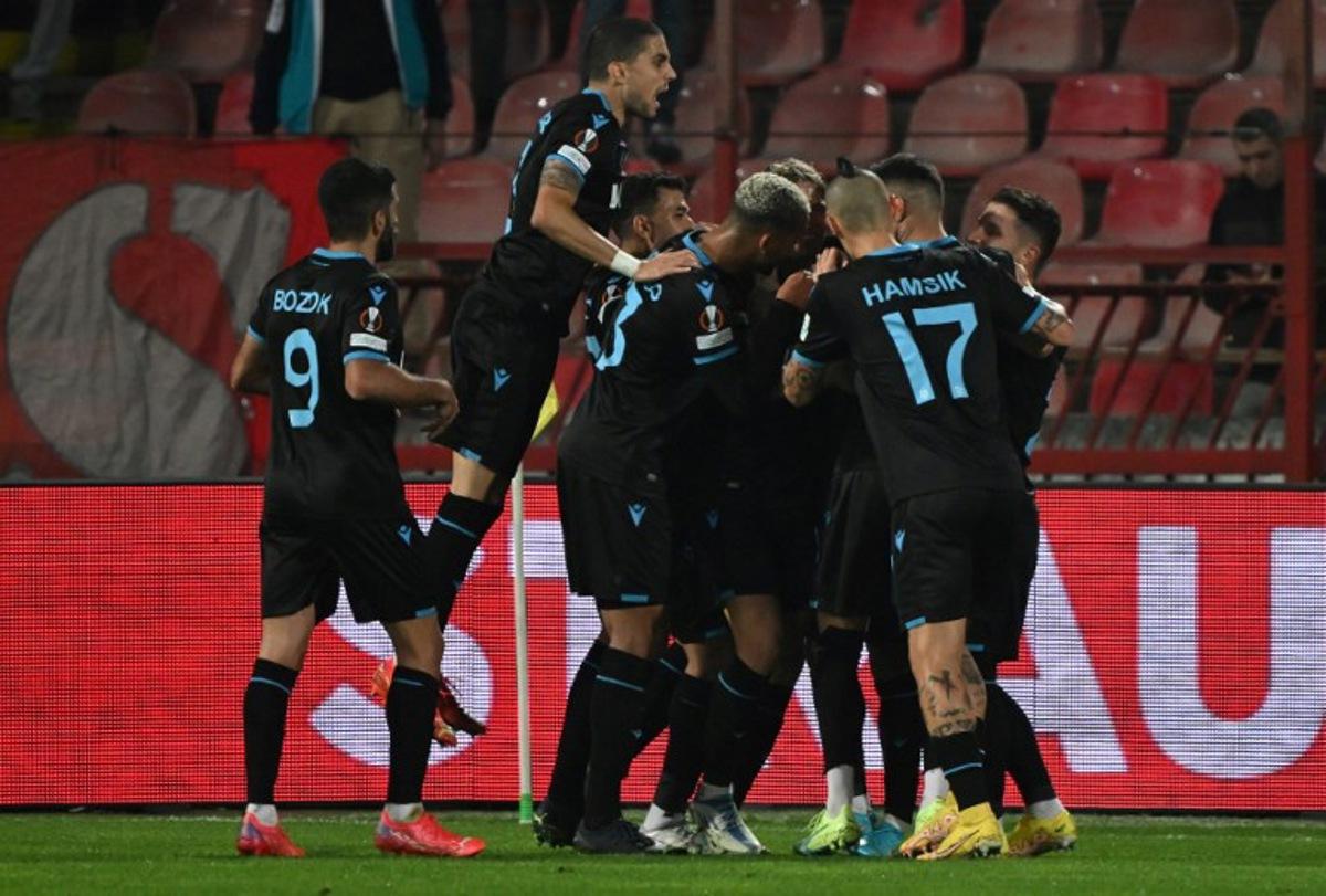 Trabzonspor's players celebrate after scoring their team's first goal during the Group H UEFA Europa League football match between Crvena Zvezda Beograd (SRB) and Trabzonspor (TUR) at The Rajko Mitic Stadium in Belgrade, on October 27, 2022. ANDREJ ISAKOVIC / AFP