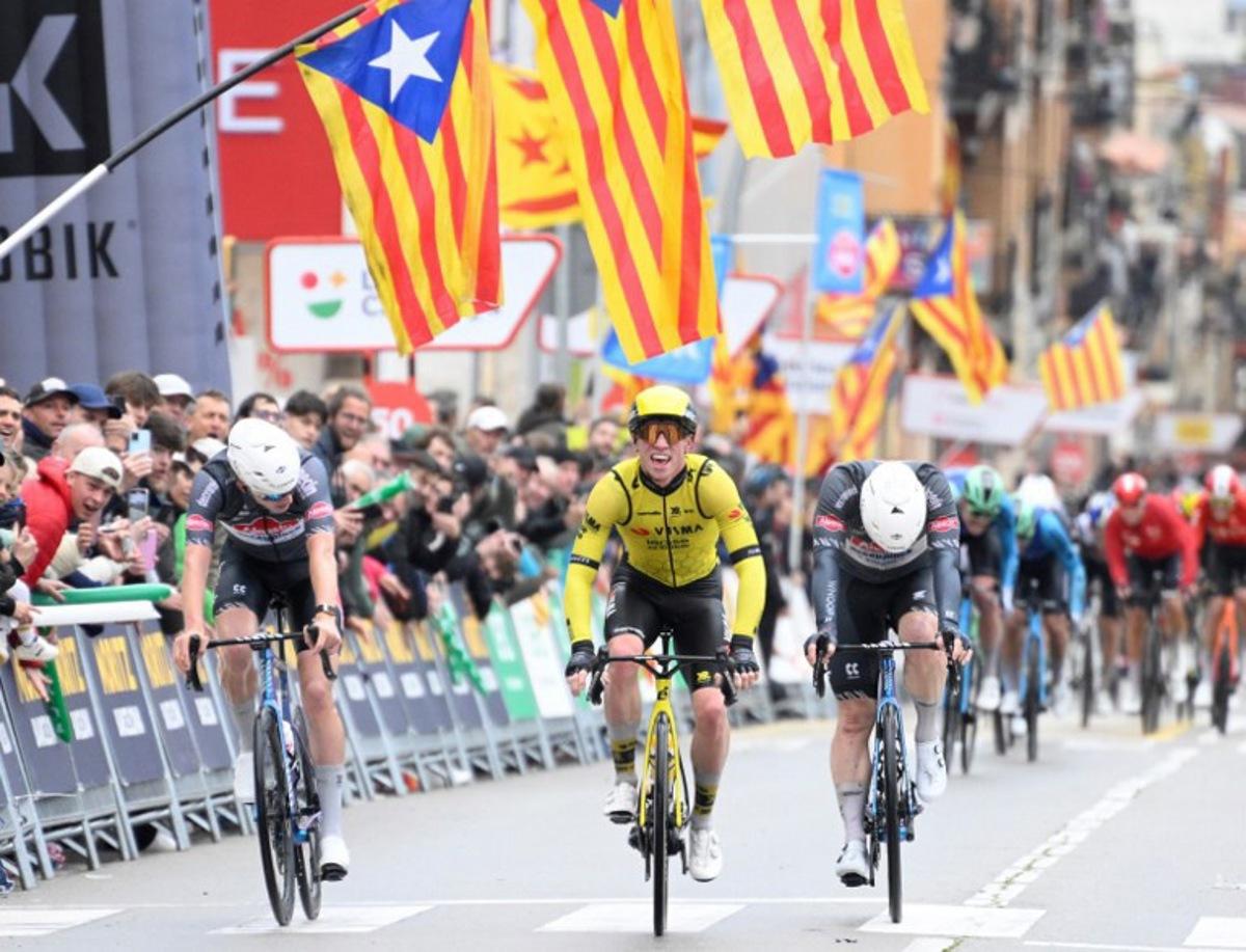 (From L) Team Alpecin's Tibor del Grosso, Team Visma's British rider James Matthew Brennan and Team Alpecin's Kaden Groves compete prior crossing the finish line of the first stage of the 2025 Volta a Catalonya cycling tour of Catalonya, a 178,3 km loop starting and finishing in Sant Feliu de Guixols, on March 24, 2025. Josep LAGO / AFP