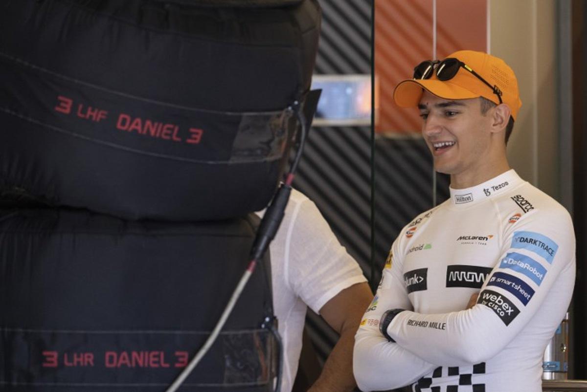 McLaren's Spanish driver Alex Palou looks on in the garage during the first practice session for the Formula One United States Grand Prix, at the Circuit of the Americas in Austin, Texas, on October 21, 2022. Jim WATSON / AFP