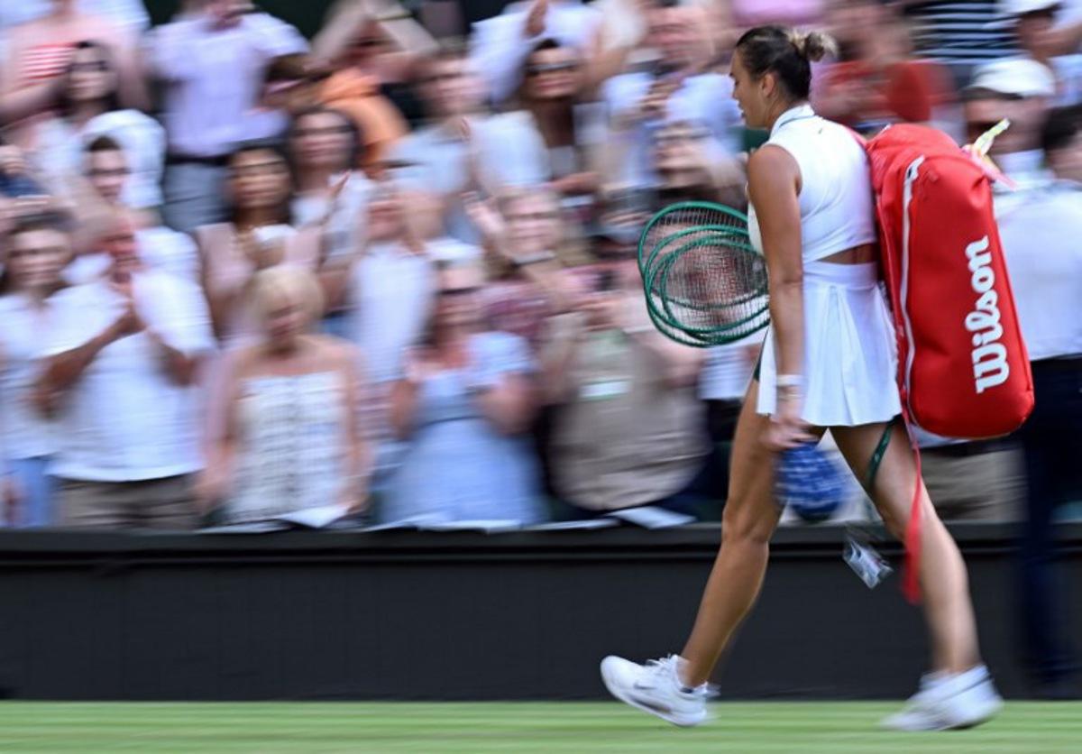 Belarus's Aryna Sabalenka leaves the court after being defeated by Japan's Naomi Osaka during their women's singles round of 16 tennis match on the seventh day of the 2026 Wimbledon Championships at The All England Lawn Tennis and Croquet Club in Wimbledon, southwest London, on July 5, 2026. Kirill KUDRYAVTSEV / AFP