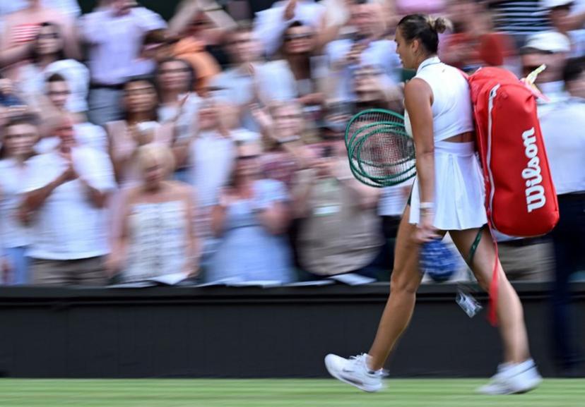 Belarus's Aryna Sabalenka leaves the court after being defeated by Japan's Naomi Osaka during their women's singles round of 16 tennis match on the seventh day of the 2026 Wimbledon Championships at The All England Lawn Tennis and Croquet Club in Wimbledon, southwest London, on July 5, 2026. Kirill KUDRYAVTSEV / AFP