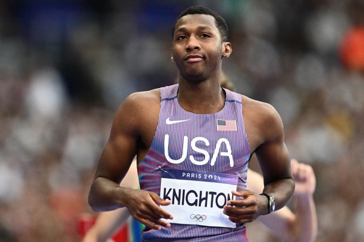 US' Erriyon Knighton reacts after competing in the men's 200m semi-final of the athletics event at the Paris 2024 Olympic Games at Stade de France in Saint-Denis, north of Paris, on August 7, 2024. Jewel SAMAD / AFP