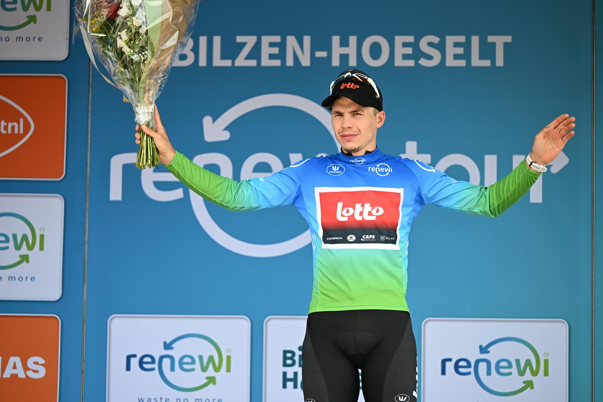 Belgian Arnaud De Lie of Lotto Cycling Team celebrates on the podium of the fourth stage of the 'Renewi Tour' multi-stage cycling race, from Riemst to Bilzen-Hoeselt (196 km) on Saturday 23 August 2025. The five-day race takes place in Belgium and the Netherlands. BELGA PHOTO DAVID PINTENS