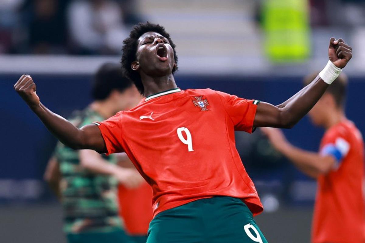 Portugal's forward #09 Anisio Cabral celebrates after scoring his team's first goal during the FIFA U17 World Cup final football match between Portugal and Austria at Khalifa International Stadium in Al-Rayyan on November 27, 2025. Karim JAAFAR / AFP