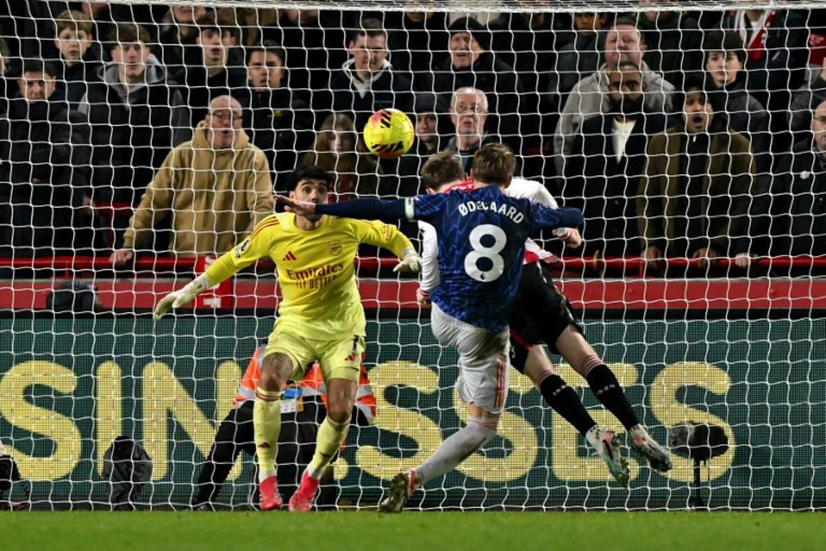 Brentford's English striker #23 Keane Lewis-Potter scores the team's first goal during the English Premier League football match between Brentford and Arsenal at the Gtech Community Stadium in London on February 12, 2026. Glyn KIRK / AFP