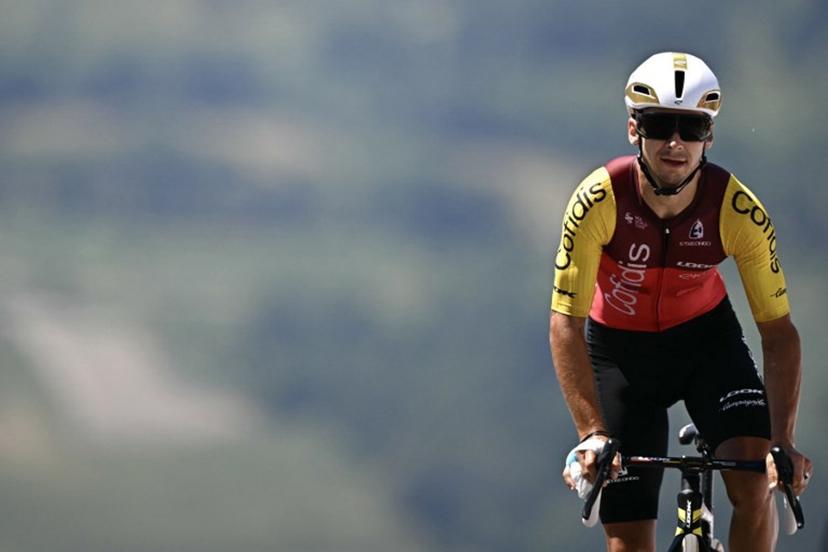 Cofidis team's French rider Bryan Coquard cycles to the finish line of the 13th stage of the 112th edition of the Tour de France cycling race, 10.9 km individual time trial between Loudenvielle and Peyragudes, in the Pyrenees mountains of southwestern France, on July 18, 2025. Loic VENANCE / AFP